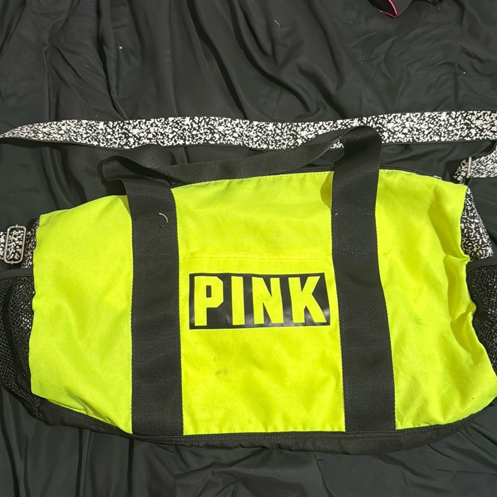 DONATING FINAL OFFER VS Pink duffle bag